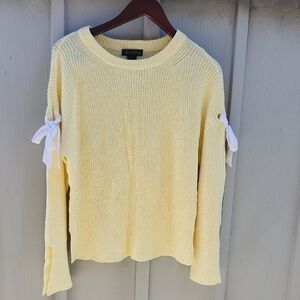 Elegant Yellow Sweater with White Bow Details